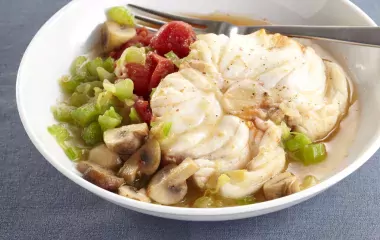 Osso bucco de lotte à la tomate et aux champignons